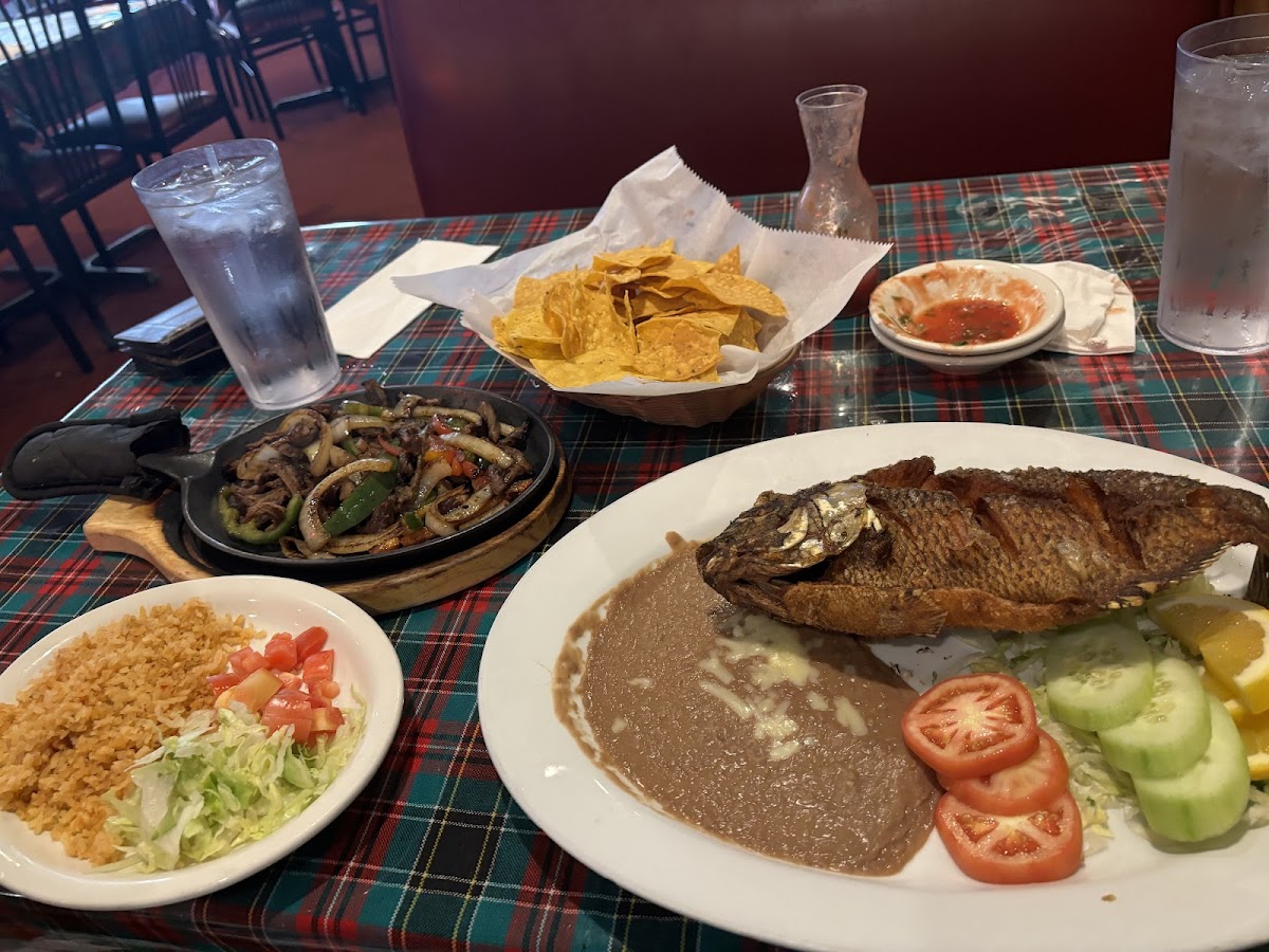 Playita Mexicana signature dishes Mojarra FritaTres LocosTaco al Pastor